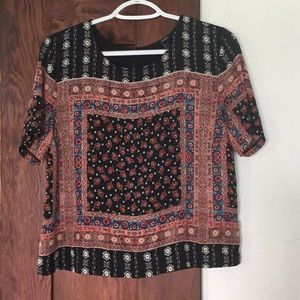 multi colored design shirt.